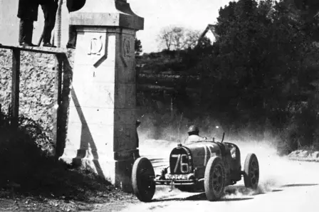 Louis Chiron harnessing the Type 35 B on the slopes of the Col de la Turbie.