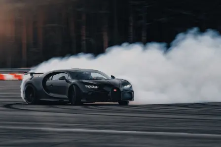 Tire smoke billows from the four wheel arches of the Chiron Pur Sport during the ‘C-Drift’.