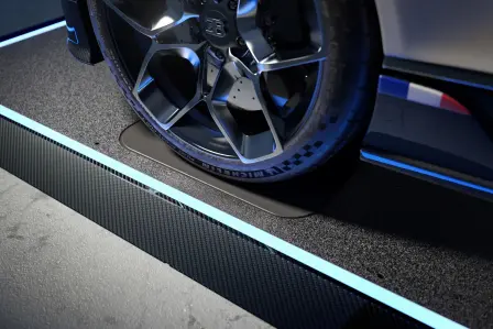 The CarPad and CarPad Pro Bugatti Edition feature signature tire protection pads seamlessly integrated into the surface, highlighting the meticulous attention to detail devoted to showcasing Bugatti's automotive jewels.