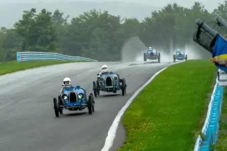 The historic Bugatti models delivered a sensational spectacle as they charged nose-to-tail around the modern Watkins Glen racing circuit.