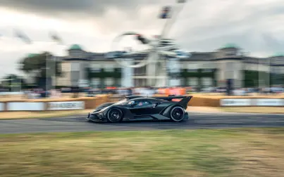 The Bugatti Bolide with its mighty 8.0-liter W16 engine shoots past spectators at the festival.