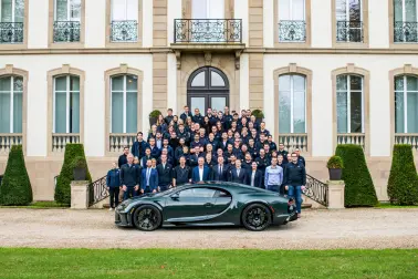 The Bugatti team around the 400th Chiron at Château Saint Jean in Molsheim.