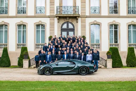 The Bugatti team around the 400th Chiron at Château Saint Jean in Molsheim.