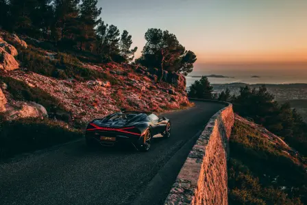 The Bugatti W16 Mistral on the road to Côte d'Azur, where it will become at one with the elements.