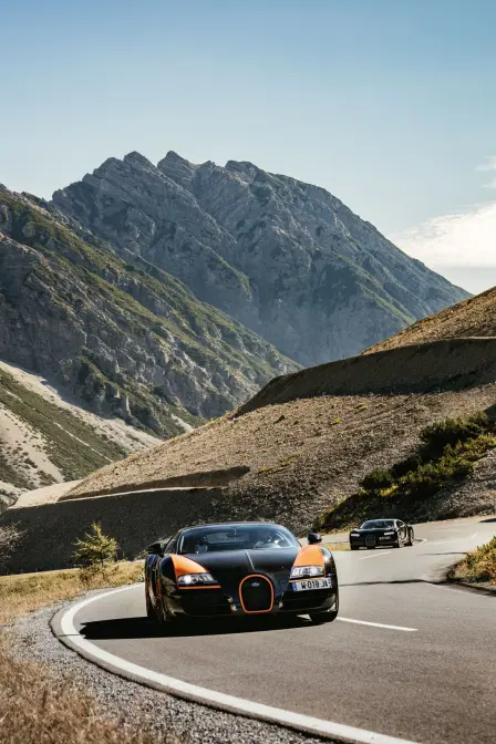 From Italy, via Austria and Germany back home: the Veyron 16.4 Grand Sport Vitesse and the Chiron Sport in front of the impressive landscapes of Austria.