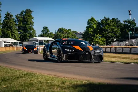 Three world-record-holding Bugatti hyper sports cars perform at Goodwood Festival of Speed 2022.
