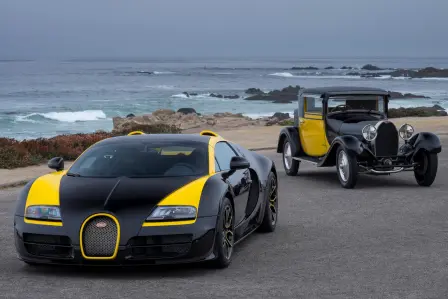 Der 2014 eingeführte Veyron 16.4 Grand Sport Vitesse „1-of-1“ und ein Type 40 Fiacre in Schwarz und Gelb.  