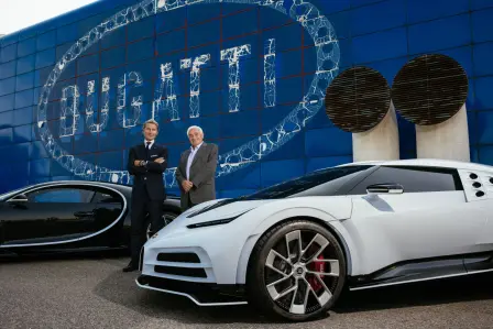 Two Bugatti eras, two Bugatti presidents: Romano Artioli and Stephan Winkelmann in front of the Fabbrica Blu.