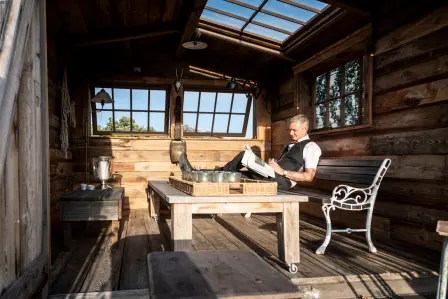 Private Sundowner: “The preferred ending of a home office day is to catch the last bit of rays in my upcycled wooden alpine cabin on the rooftop terrace.”