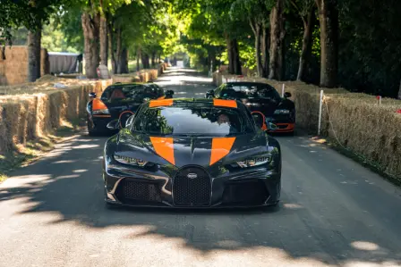 Three world-record-holding Bugatti hyper sports cars perform at Goodwood Festival of Speed 2022.
