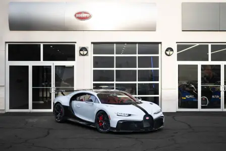 The first Bugatti Chiron Pur Sport finished in Quartz White and Grey Carbon is delivered to its new owner.