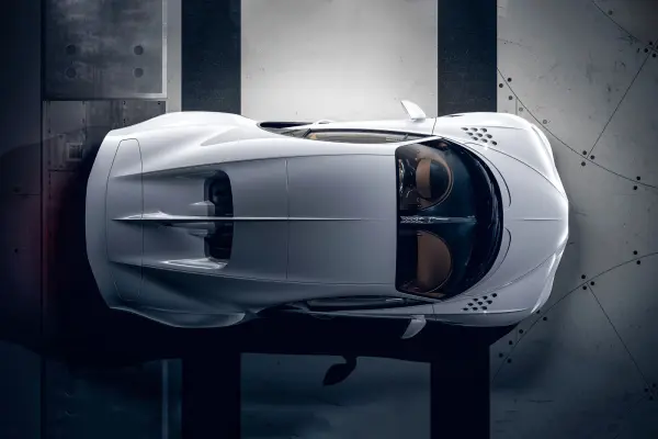 « Créer une voiture autour du moteur W16, capable de battre des records, exige un énorme travail d'équilibrage des forces aérodynamiques et de gestion active de la température. Achim a une compréhension technique très naturelle de toutes ces exigences, capable de créer de la beauté à partir de la nécessité. », Christophe Piochon, Président de Bugatti Automobiles.  
Bugatti Chiron Super Sport