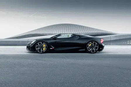 The Bugatti W16 Mistral in front of the dune-shaped building of the BEEAH Group in Sharjah.