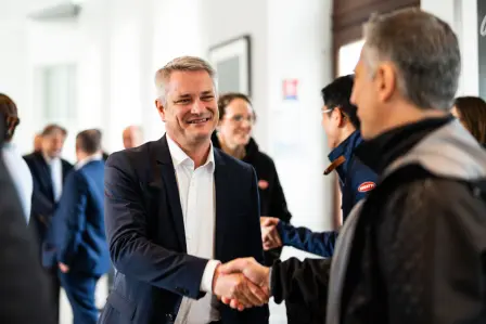 Christophe Piochon, President of Bugatti, welcoming Service Partners to Molsheim. Strengthening relationships and honoring contributions at the heart of the brand.