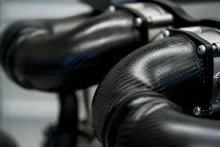 Lightweight carbon cuts the weight of the engine