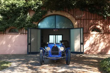 The iconic horseshoe grille has undergone several evolutions over time, while remaining one of Bugatti's design signatures.
