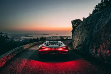 At nightfall, the W16 Mistral's ‘X’-shaped taillight illuminates the roads of southern France.