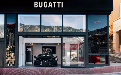 The Bugatti Monaco showroom is located on the Formula 1 racetrack at the famous La Rascasse bend.