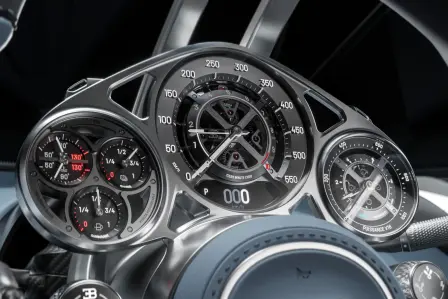 The engineering and design excellence of the Bugatti Tourbillon is perfectly illustrated by its analogue instrument panel, meticulously crafted by Swiss watchmakers.